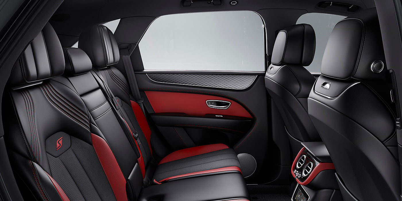 Bentley Beijing - Sanlitun Bentey Bentayga S interior view for rear passengers with Beluga black and Hotspur red coloured hide.