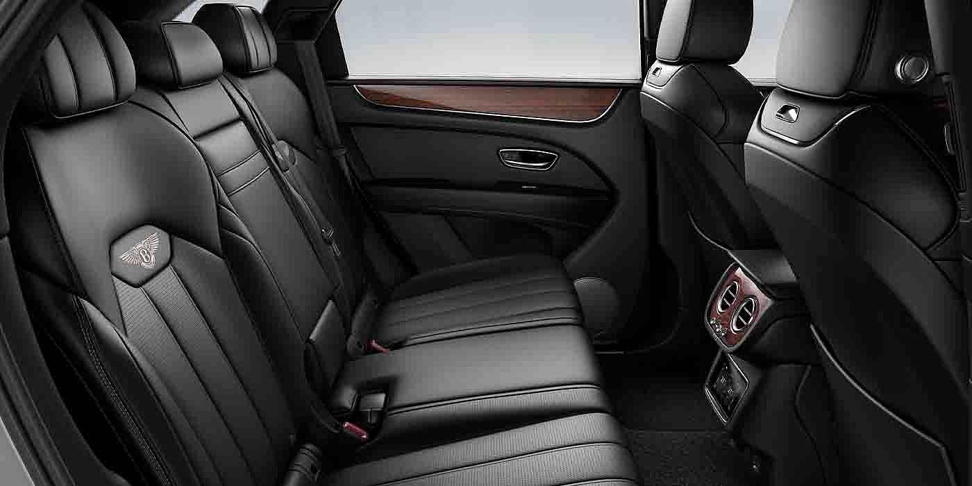 Bentley Beijing - Sanlitun Bentley Bentayga EWB interior view for rear passengers with Beluga black hide.